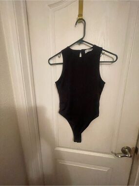 Sleeveless Black Bodysuit with High Neck